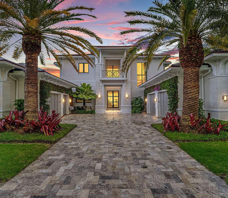 Interior shot of a living room with a tropical view